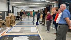 flooring retailers meet with students enrolled in the Basic Floor Covering Installation program 