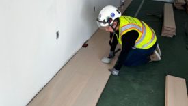 IUPAT Student Installing Flooring.jpg